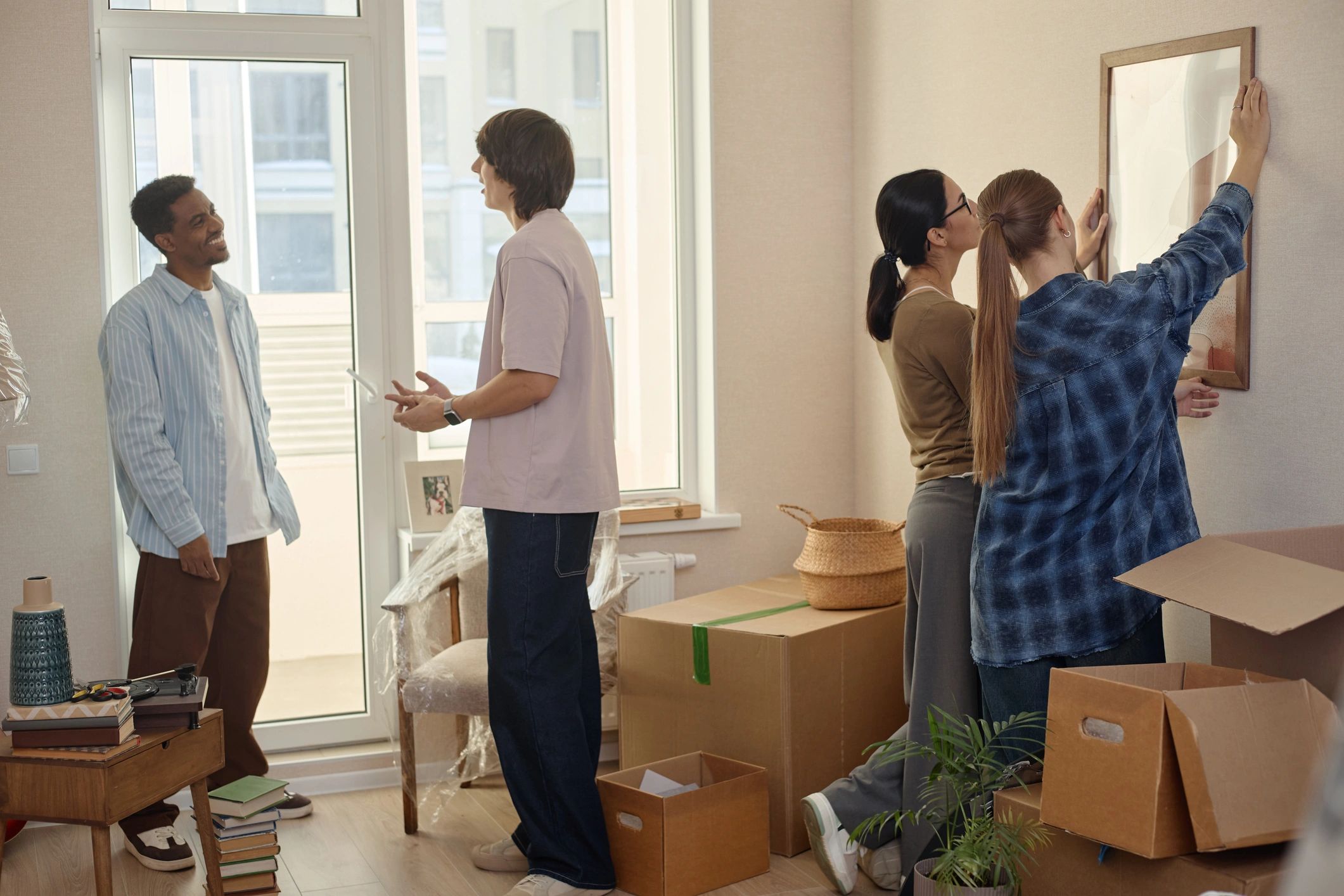People settling into a new home after moving